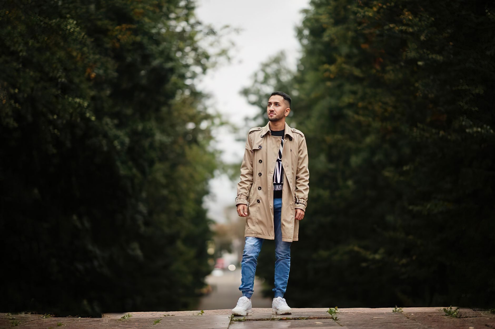 Man walking outdoors thoughtfully with hopeful recovery mood